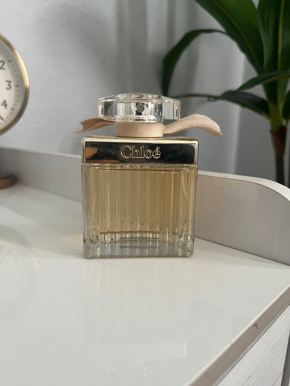 Chloé Eau de Parfum in Pale Gold Bottle with Pink Ribbon